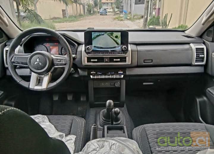 Photo 4 AUTO.CI : Mitsubishi L200 2.0l