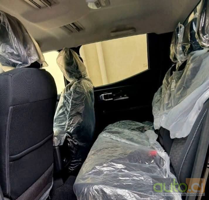 Photo 5 AUTO.CI : Mitsubishi L200 2.0l